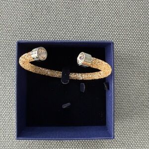 Swarovski Gold-Tone Bangle Bracelet with Silver Accents